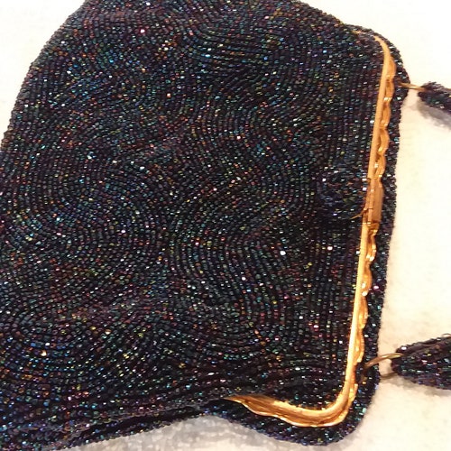 Saks Fifth Avenue shops beaded evening bag