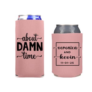 May include: Two pink can coolers. One cooler has the text "about DAMN time" in black script. The other cooler has the names "Veronica and Kevin" inside a black square, with the date "11-01-25" below.