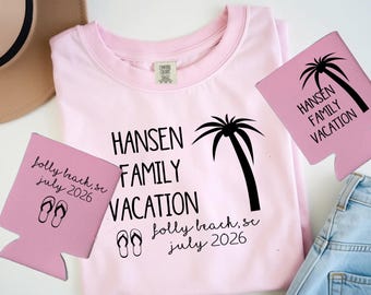 May include: A light pink t-shirt and two pink can coolers with the text "HANSEN FAMILY VACATION" and a palm tree graphic. The shirt and coolers also include the text "jolly beach, sc july 2026".