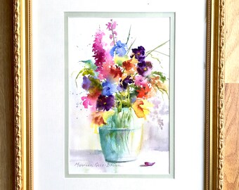 May include: A watercolor painting of a bouquet of colorful flowers in a vase. The flowers are pink, purple, yellow, and orange. The vase is a light blue color. The painting is signed "Maureen Gass-Brown".