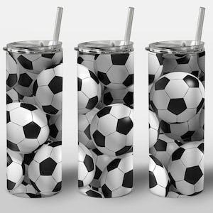 May include: Three stainless steel tumblers with a black and white soccer ball pattern. The tumblers have lids and straws.