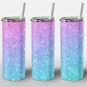 May include: Three stainless steel tumblers with lids and straws. The tumblers are covered in a glittery ombre design that transitions from pink to blue.
