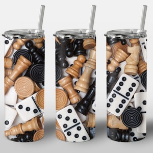 May include: A stainless steel tumbler with a design of various game pieces, including dominoes, chess pieces, and checkers. The pieces are in black, white, and brown.
