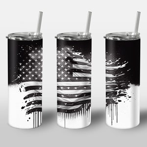 May include: Three stainless steel tumblers with black and white American flag designs. The flags are distressed and have a paint splatter effect. Each tumbler has a clear lid and a straw.