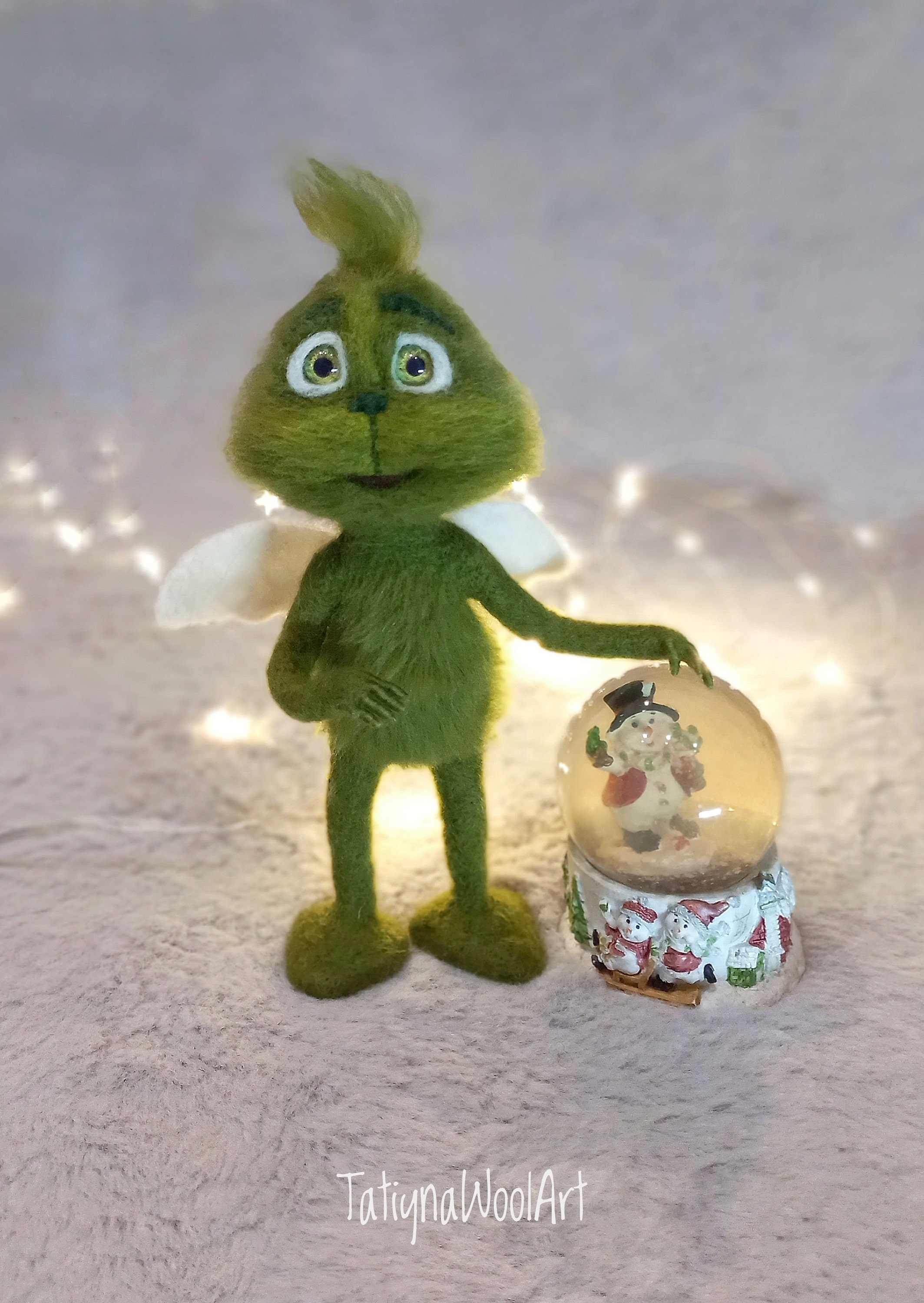 Baby grinch sales plush doll