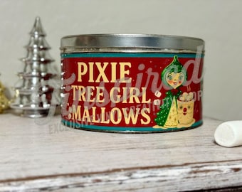 May include: A vintage red tin with the words "Pixie Tree Girl Mallows" in gold lettering. The tin features a cartoon girl in a green outfit holding a cup of marshmallows. A silver Christmas tree is in the background.