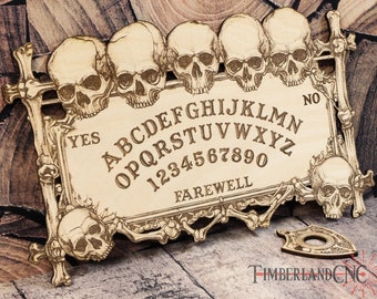 May include: Wooden Ouija board with a skull design and the letters A-Z, numbers 0-9, YES, NO, and GOODBYE. The board is surrounded by a decorative frame with skulls and crossbones.