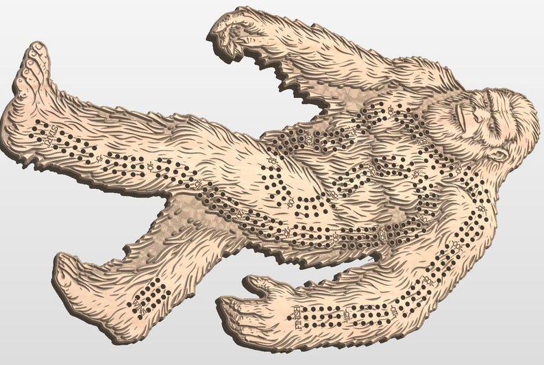 May include: A wooden game board shaped like a Bigfoot, with a brown stain and black dots for the game pieces.