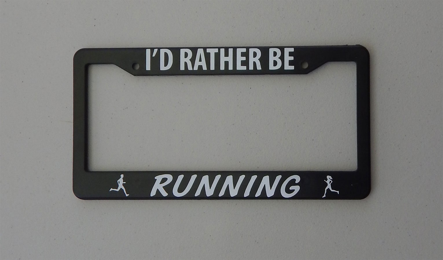 Frame running. License plate frame. black will run license plate.