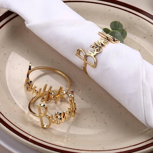 Portatovaglioli "Bismillah" argento | oro | nero