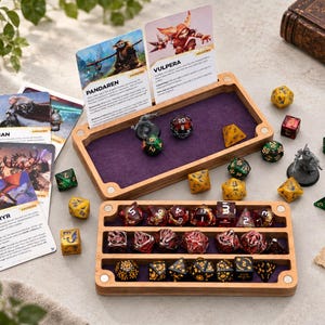 May include: A wooden tabletop gaming accessory set featuring a rectangular dice tray with a purple felt lining and a matching three-tiered dice storage rack. The set includes various multi-sided dice, miniature figurines, and character cards.