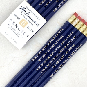 May include: Set of six blue pencils with gold lettering. Each pencil has a quote from Shakespeare's A Midsummer Night's Dream. The quotes are: "True love never did run smooth." "My heart is true as steel." "Though she be but little, she is fierce." "Lord, what fools these mortals be!" "Yet we sleep, we dream." "Are you sure that we are awake?"