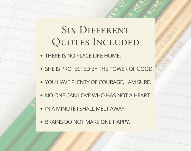 May include: A cream-colored card displays six inspirational quotes in black text. The phrases include "There is no place like home" and "She is protected by the power of good." Pencils with green and yellow text are in the background.