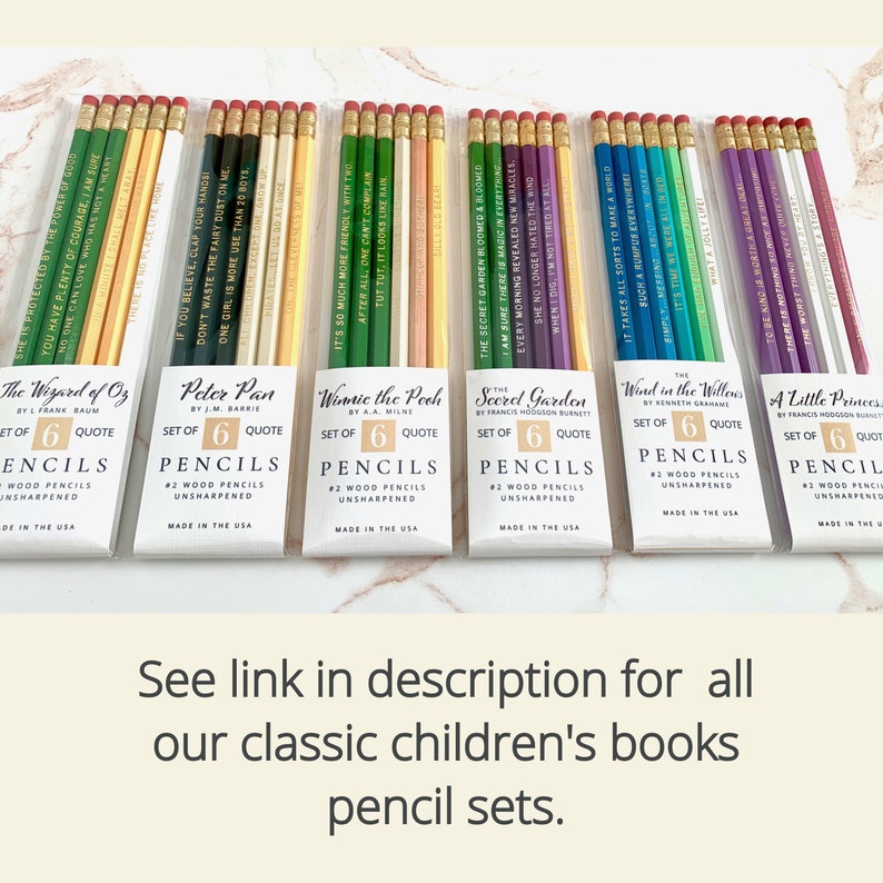 May include: A collection of pencil sets featuring quotes from classic children's books like "The Wizard of Oz" and "Peter Pan." Each set includes six unsharpened #2 wood pencils with quotes printed on them. The pencils have various colors and are packaged in white boxes.