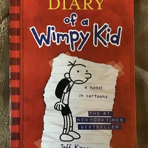 Assortment of Diary Of A Wimpy Kid by Jeff Kinney—Paperbacks and Hardbacks