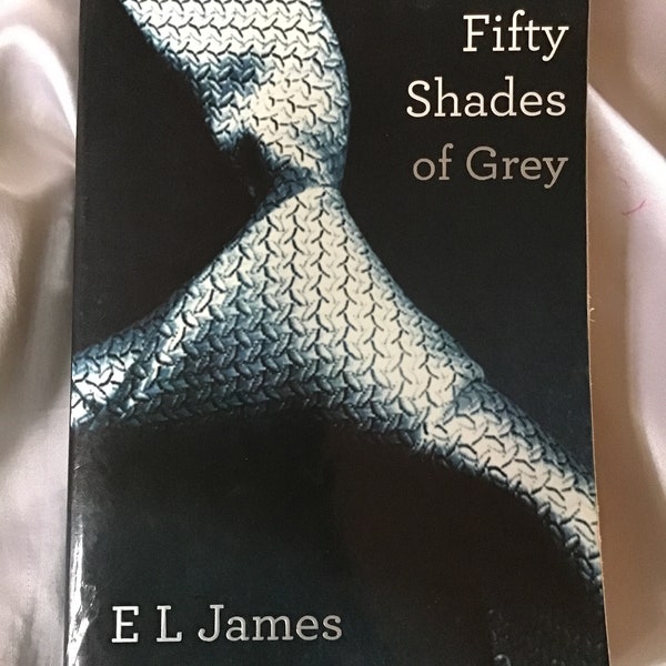 Assortment of E L James-Fifty Shades Series- Large Paperback Novels