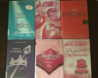 Assorted Meg Cabot Hardback, Large and Small paperback novels.  Princess Diaries, Avalon High, Abandon Series