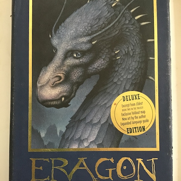 Assortment Christopher Paolini-Eragon Series-Hardback and Large Paperback Novels