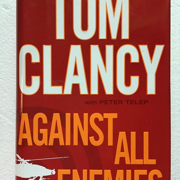 Assortment of Tom Clancy Hardback and Large and Small Paperback Novels