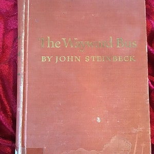 Assortment of John Steinbeck Hardback and Large and Small Paperback Novels