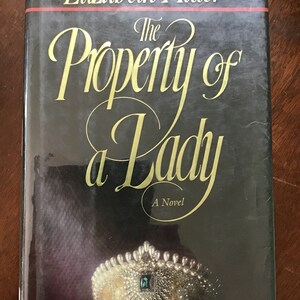 Assortment of Elizabeth Adler Hardback and Large Paperback Novels