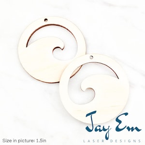 May include: Two unfinished wooden circles with a wave cut out. The circles are 1.5 inches in diameter. The text "Jay Em Laser Designs" is at the bottom of the image.