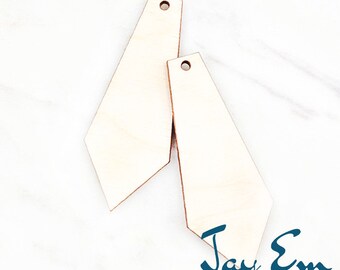 May include: Two unfinished wooden diamond-shaped earrings with a hole at the top for hanging. The earrings are 2 inches in size. The image includes the text "Jay Em Laser Designs".
