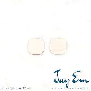 May include: Two small, square wooden earrings with rounded corners. The earrings are a light, natural wood color. The text "Jay Em Laser Designs" is written in a teal script font.