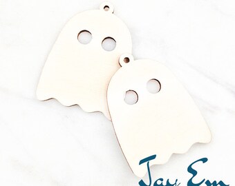 May include: Two unfinished wooden ghost ornaments with holes for eyes. The ghosts are approximately 1 inch in size. The ornaments are ready to be painted or decorated.