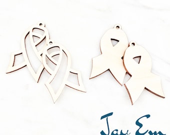 May include: Three unfinished wooden ribbon shapes, two are tied together and the third is separate. The ribbons are 1.5 inches in size. The image includes the text "Jay Em Laser Designs".