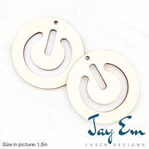 May include: Two unfinished wooden power button shapes, each with a hole for hanging. The shapes are 1.5 inches in diameter. The image is from Jay Em Laser Designs.