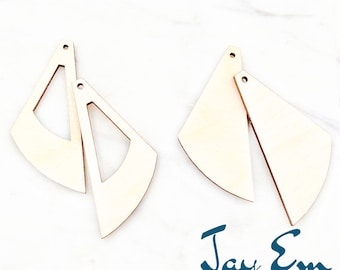 May include: Four unfinished wooden earrings with a geometric design. Each earring is approximately 5.08 cm in size. The earrings have a hole at the top for hanging. The logo "Jay Em Laser Designs" is in the bottom right corner.