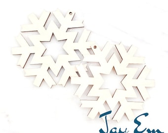 May include: Two unfinished wooden snowflake ornaments with a star in the centre. The snowflakes are 5 cm in diameter. Jay Em Laser Designs.