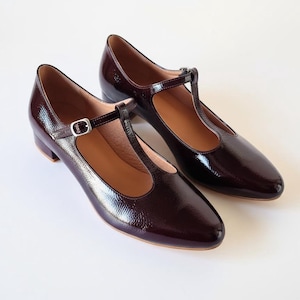 Polished Dark Burgundy T-Strap Pumps, Round Toe, Buckle Closure, Women's Trendsetting Shoes, 2.5 cm Low Heel, Chic Early Autumn Ballet Flats