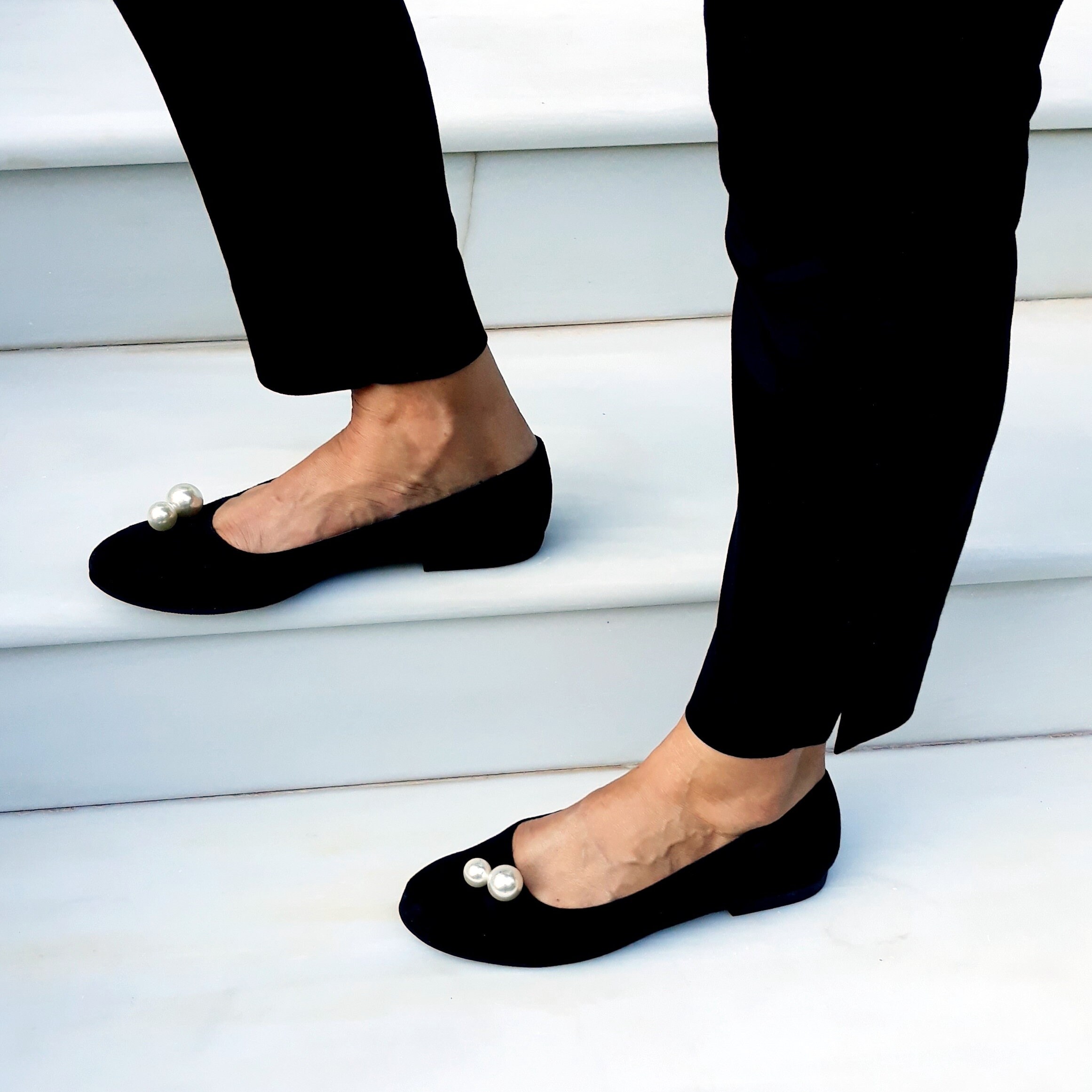 black suede flat pumps