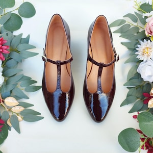 Polished Dark Burgundy T-Strap Pumps, Round Toe, Buckle Closure, Women's Trendsetting Shoes, 2.5 cm Low Heel, Chic Early Autumn Ballet Flats