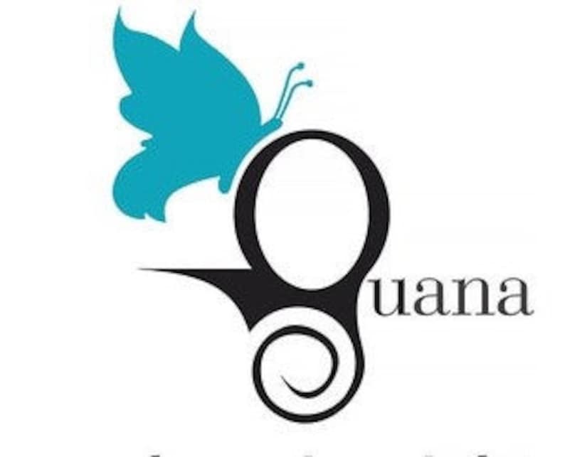 May include: A black and white butterfly with a teal blue body is perched on a black stylized letter 'G' with the word 'guana' in black text.