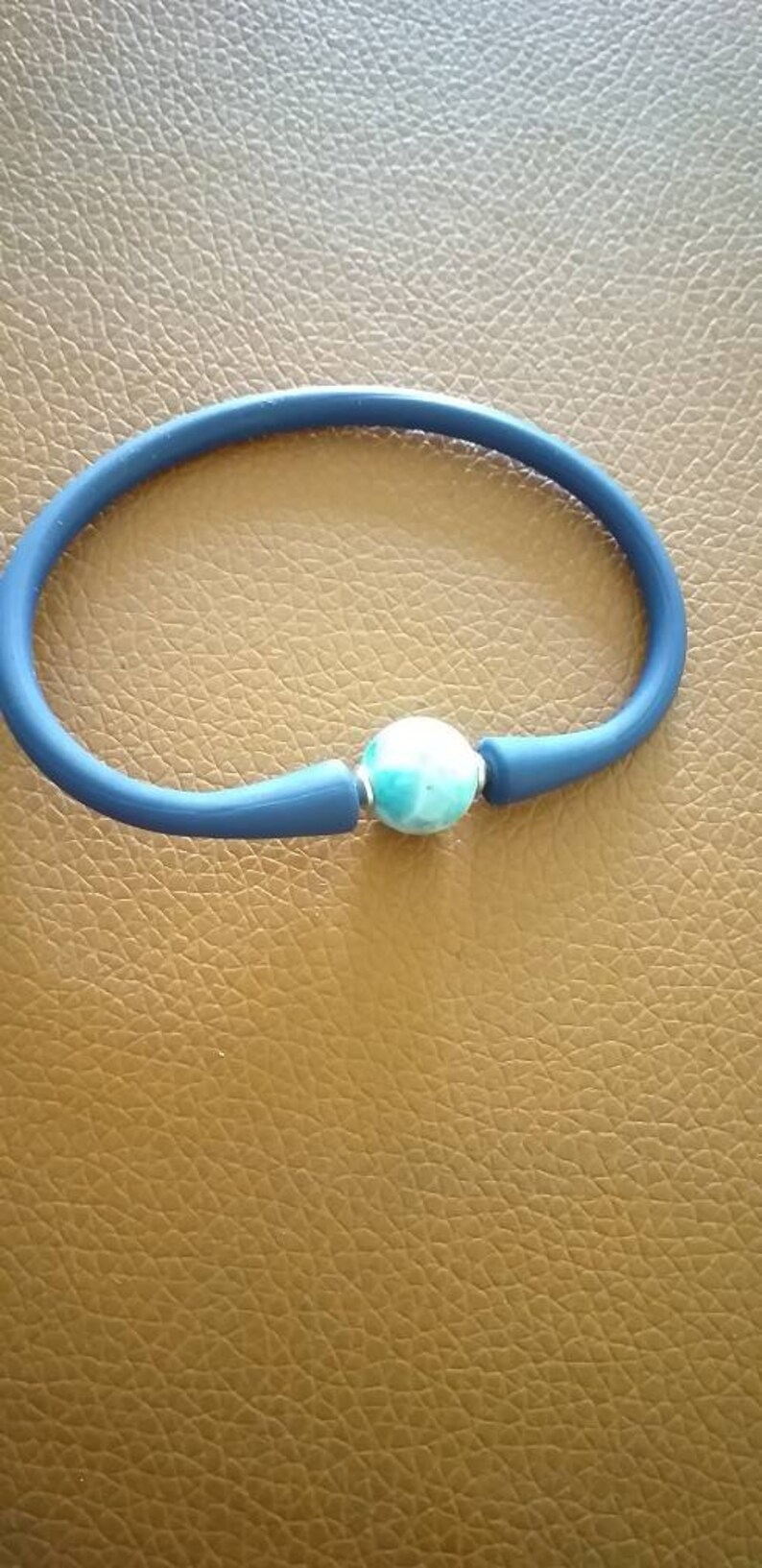 an elastic and stainless steel bracelet with larimar