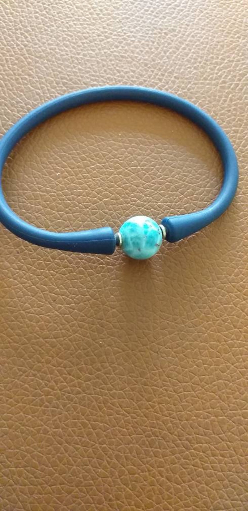 an elastic and stainless steel bracelet with larimar