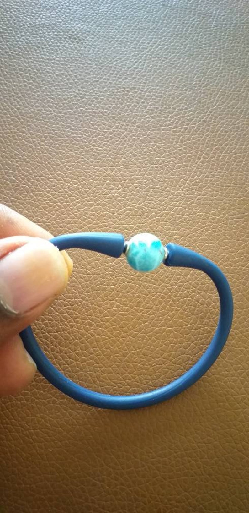 an elastic and stainless steel bracelet with larimar