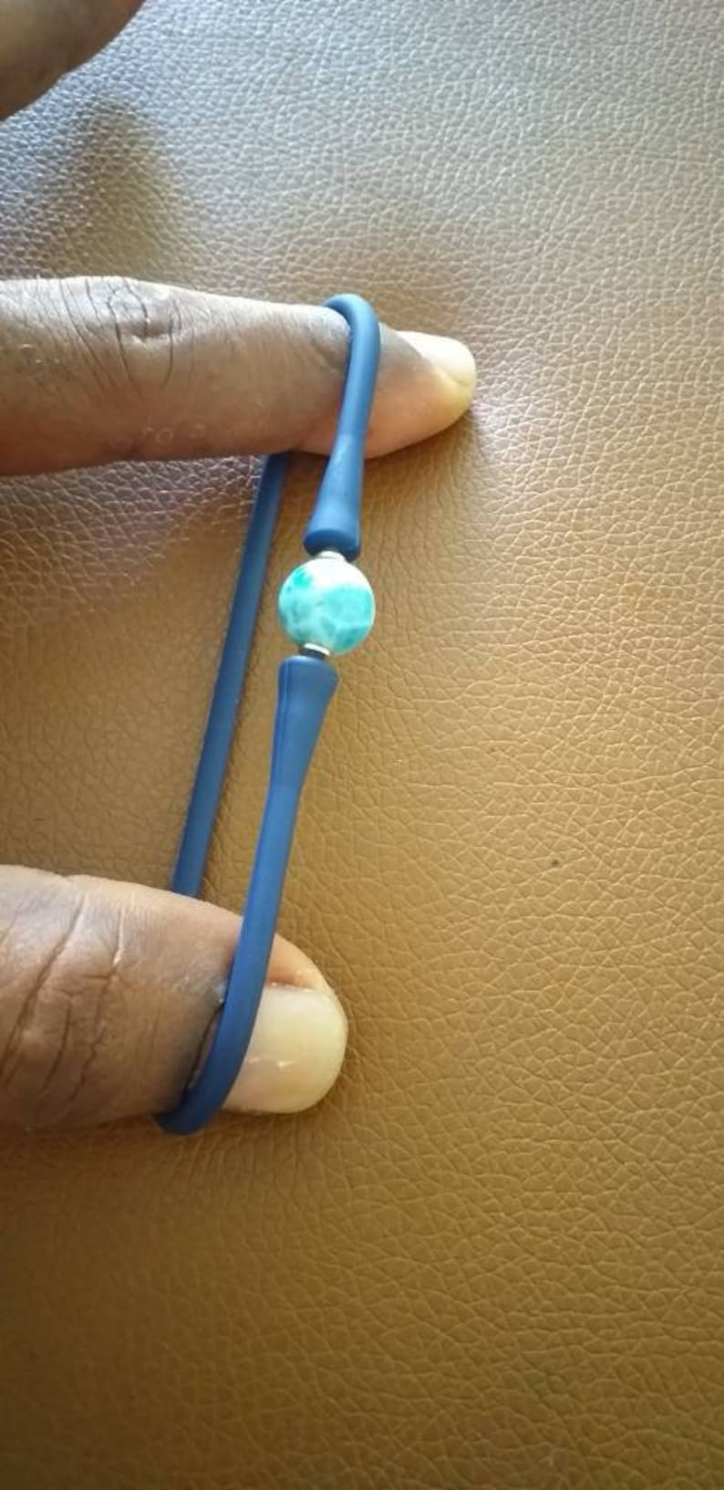 an elastic and stainless steel bracelet with larimar