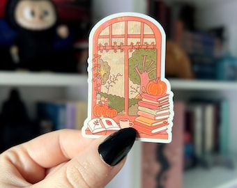Cozy Reader Window Sticker | Bookish Fall Window Sticker with Books & Leaves | Holographic Cozy Rainy Autumn Sticker for Kindle, Kobo, iPad