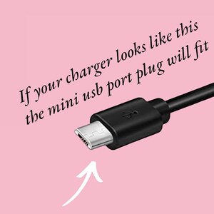 May include: Close-up of a black micro USB connector. The text reads "If your charger looks like this the mini usb port plug will fit".