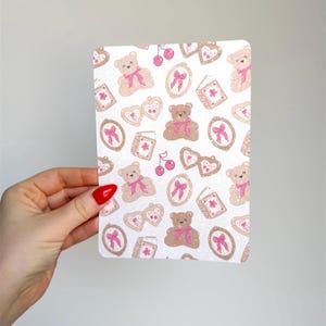 May include: A set of three ceramic mugs with a speckled, matte finish. The mugs are in shades of cream, light gray, and dark gray. Each mug has a simple, minimalist design, perfect for coffee or tea.