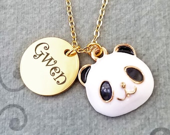 May include: Gold chain necklace with a round pendant engraved with the name "Gwen" and a white panda charm.