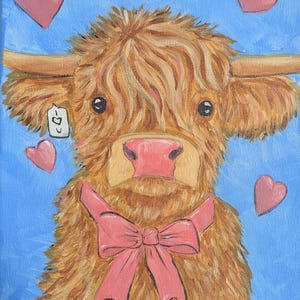 May include: A painting of a Highland cow with a pink bow and pink hearts on a blue background. The cow has long, shaggy, light brown fur, a pink nose, and a small tag hanging from its ear.