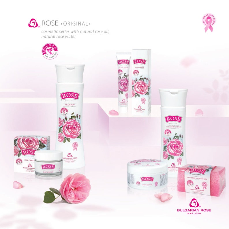 May include: A collection of cosmetic products from the Rose Original series, featuring white bottles and containers adorned with pink rose illustrations. The products include shampoo, day cream, cleansing milk, and body butter, with the brand name prominently displayed.