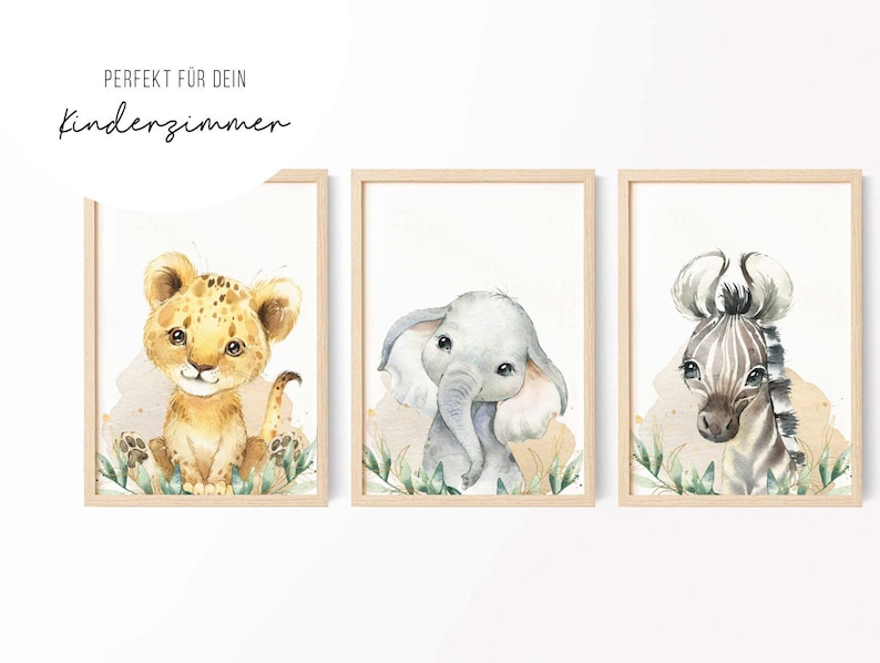 May include: Three framed watercolor illustrations of baby animals. The first frame features a lion cub with brown spots, the second frame features a gray elephant with large ears, and the third frame features a zebra with black and white stripes.