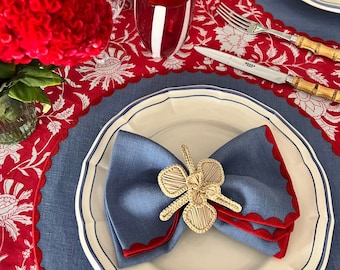 Blauwe linnen ronde placemats met rand, feesttafeldecor