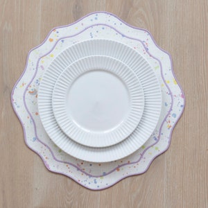 Pastel watercolor splash white linen table mats with colorful double trim for table decor